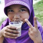 A girl enjoys Mingo in Ungkaya, Basilan province, Mindanao