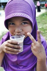 A girl enjoys Mingo in Ungkaya, Basilan province, Mindanao