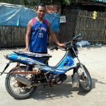 Albert, a Peter Project beneficiary, was able to buy a motorcycle from fishing
