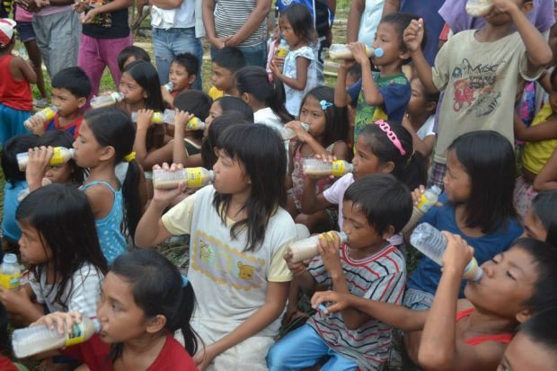 Haiyan evacuees drink Mingo for nutrition and for fun