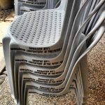 The beneficiaries of The Peter Project donate chairs to their church