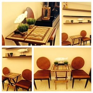 Mosaic folding table adorns a rental condo