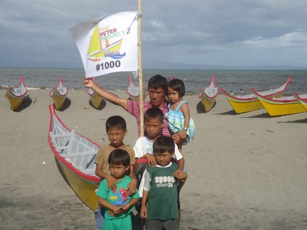 Rolando Pamplona of Palo, Leyte, received NVC's 1,000th Peter Project boat in March 2014