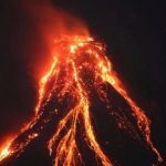 Lava spewing out of the crater of the Mayon volcano