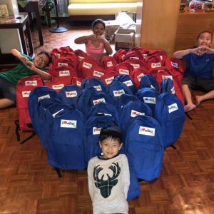 The Ong family fills Christmas bags instead of stockings