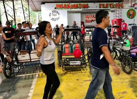 NVC family plays musical pedicabs at their Christmas party